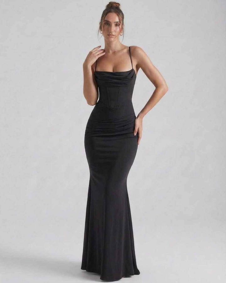 Vestido blanco maxi sin mangas para mujer, con tirantes finos y ajuste elegante, ideal para coctel o noche.