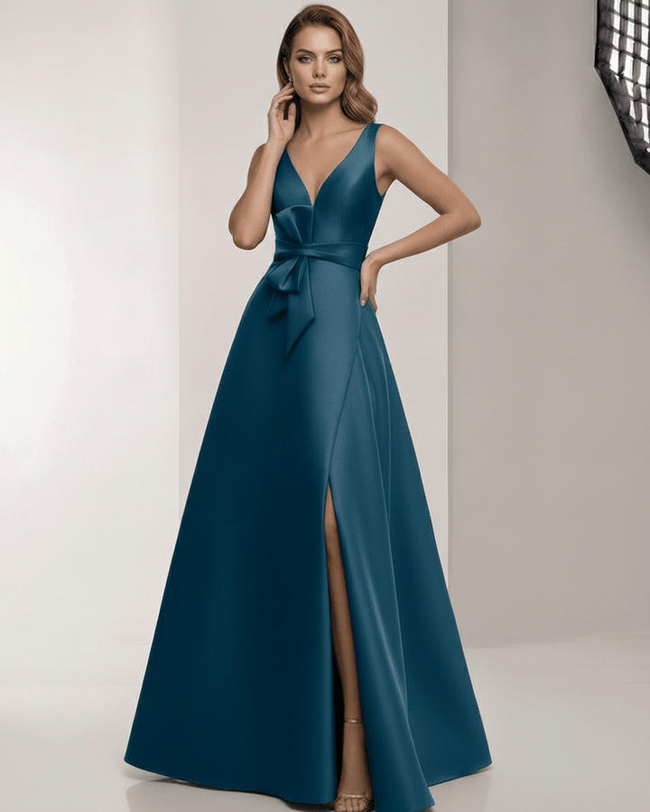 Vestido largo fluido azul verdoso para mujer. Vestido maxi elegante con lazo ajustable, ideal para ocasiones de noche.