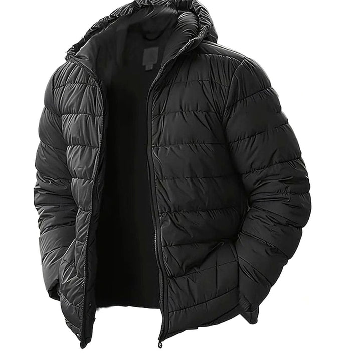 Chaqueta acolchada de hombre con capucha, acabado engomado. Ideal para invierno, cálida y resistente al viento urbano.