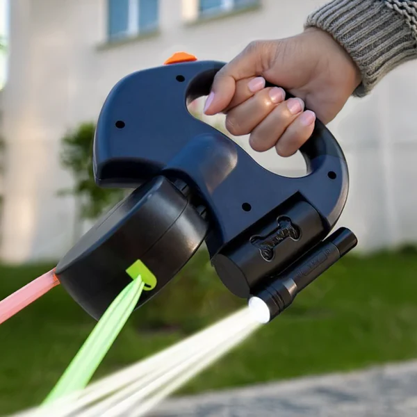 Correa retráctil dual para perros, ideal para pasear dos mascotas cómodamente y con control.