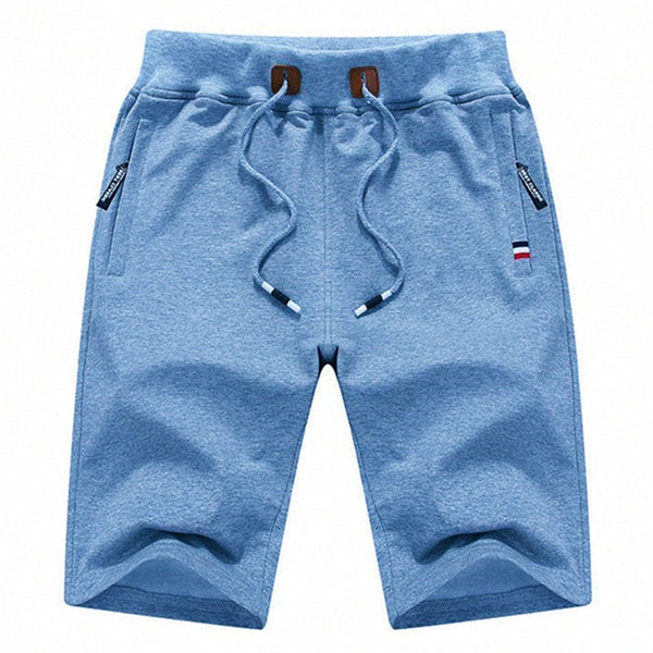 Pantalones cortos de algodón transpirable para hombre, bolsillos con cremallera, un estilo casual.