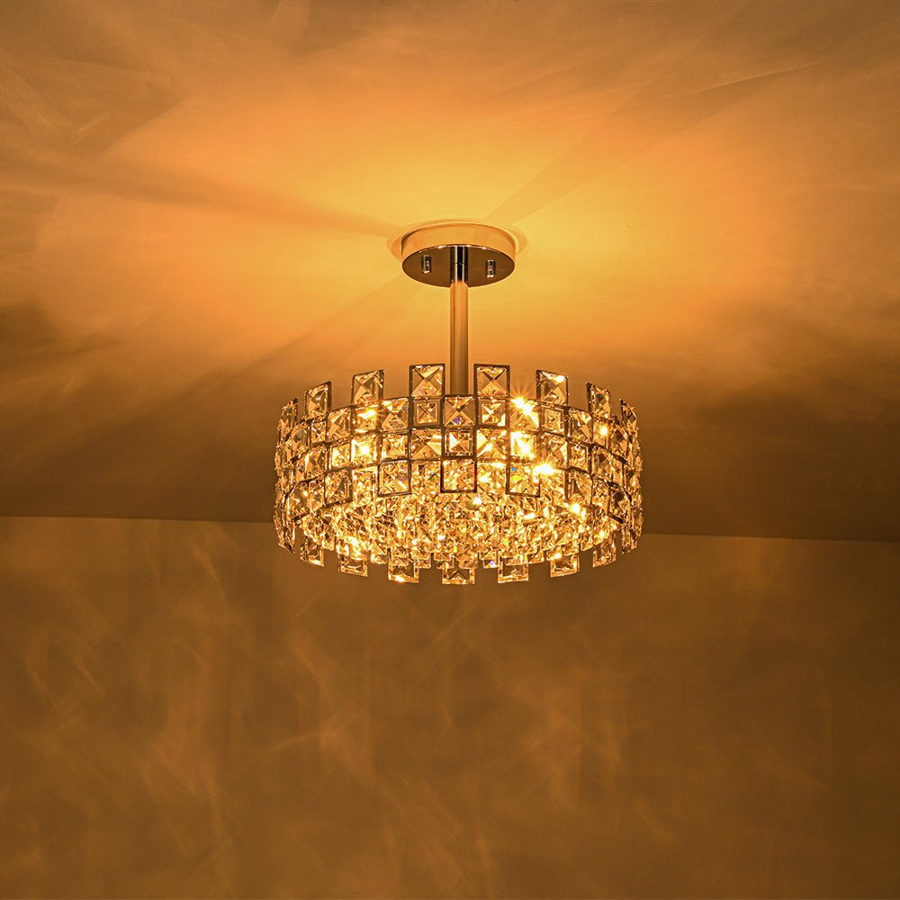 Lámpara de techo de 4 luces de cristal estilo glam. Detalles cromados o dorados. Ideal para decoración interior.