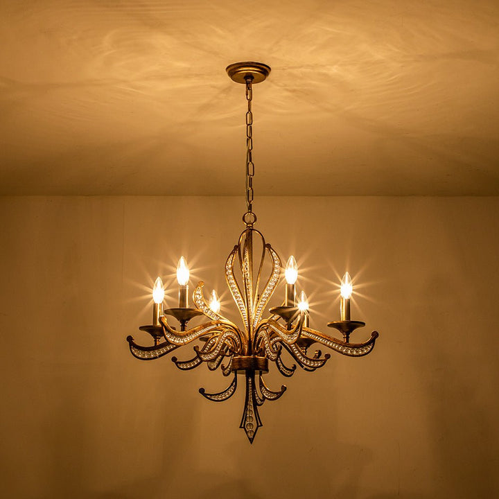 Candelabro antiguo de cristal francés de 6 brazos, estilo vela, perfecto para ambientes vintage y elegantes.