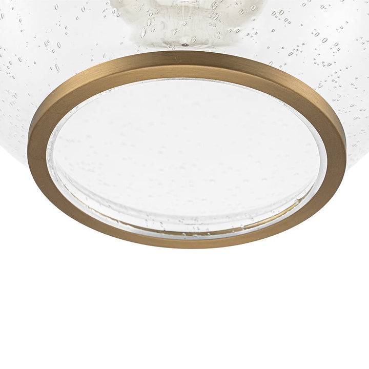 Lámpara de techo contemporánea, vidrio semilla y latón, embellece tu mesa de comedor.