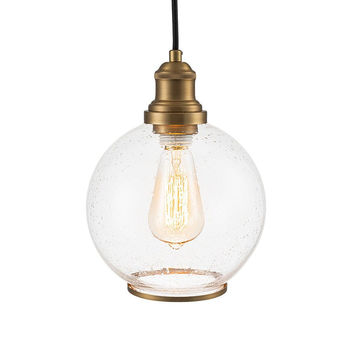 Lámpara colgante de diseño globo, vidrio semilla, ideal para mesa de comedor o isla de cocina.