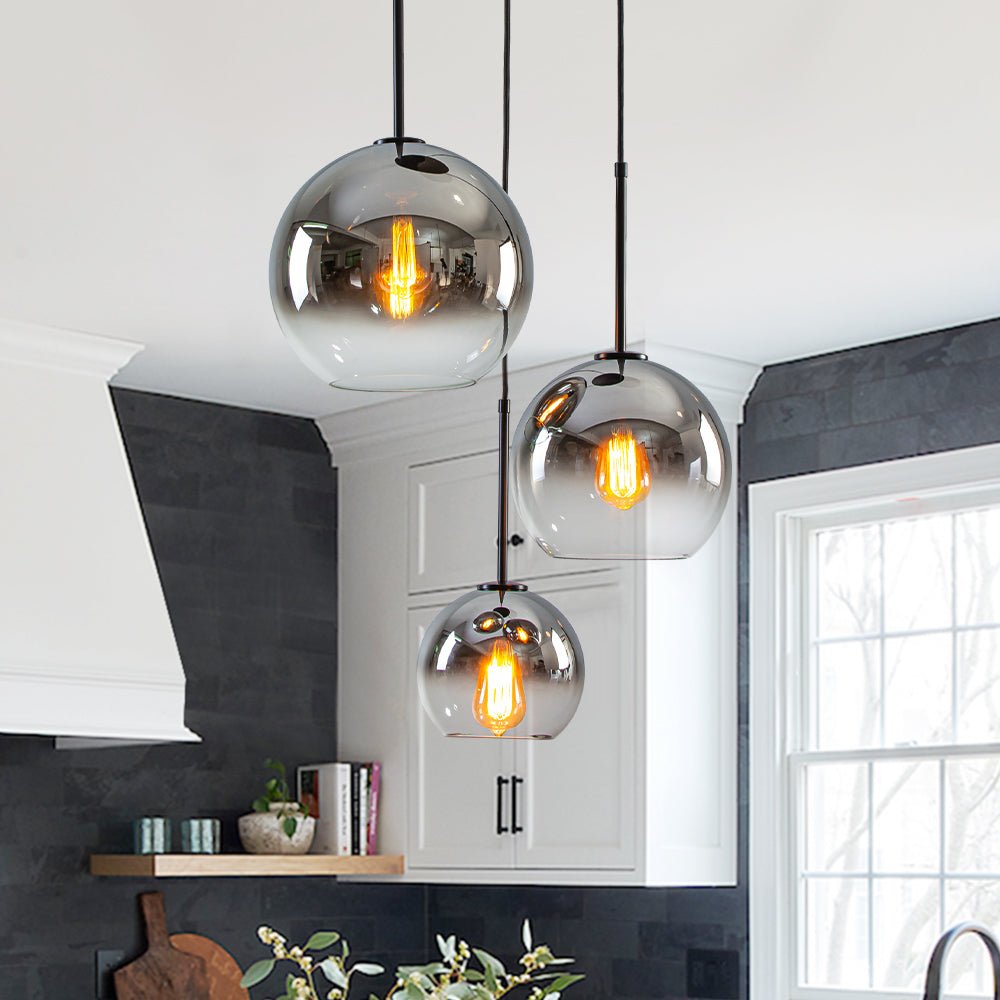 Lámpara colgante esférica moderna de 3 luces con vidrio gradiente, ideal para iluminación contemporánea.