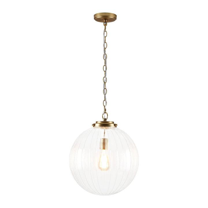 Colgante estriado con vidrio texturizado. Diseño contemporáneo y luz interior sofisticada.