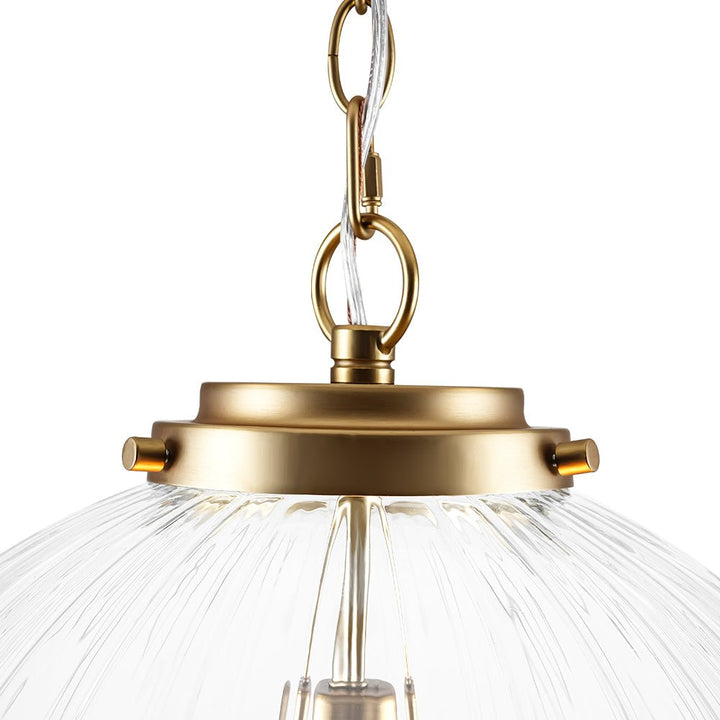 Colgante moderno de esfera estriada. Vidrio texturizado que crea un ambiente acogedor y luz interior.