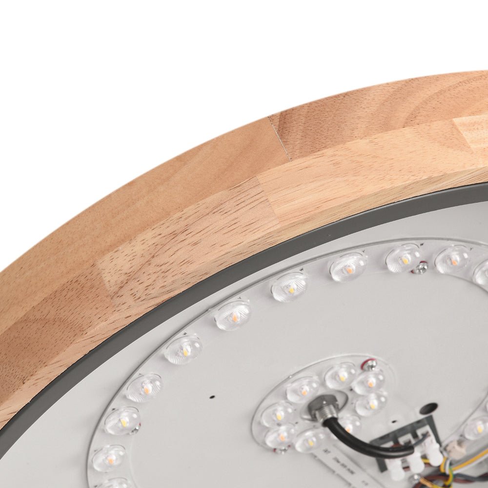 Luz LED de techo redonda regulable con control remoto, diseño moderno y acento de madera natural.