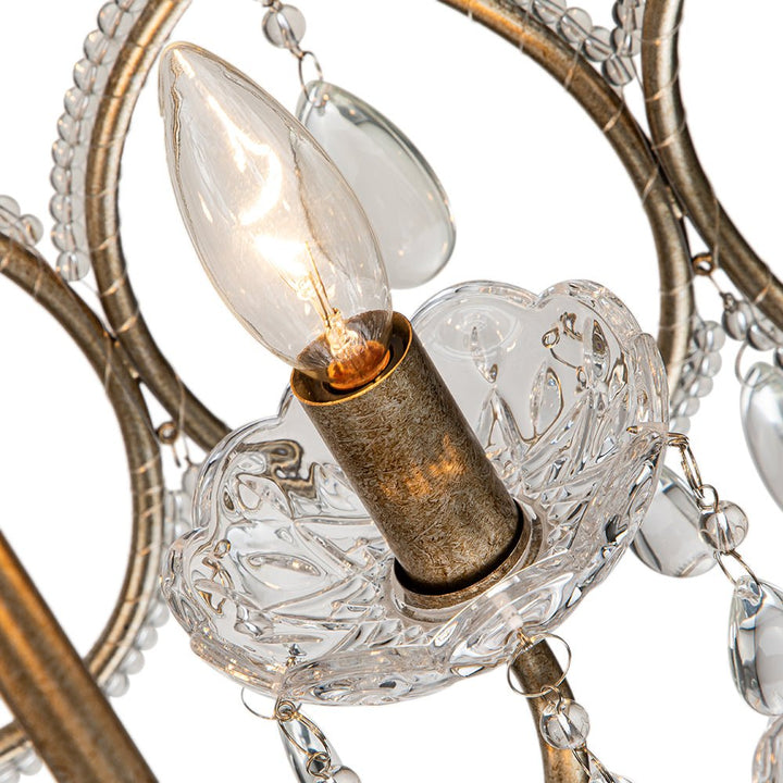 Detalle de los cristales facetados del candelabro tambor vintage 5 luces francés. Iluminación clásica y sofisticada.