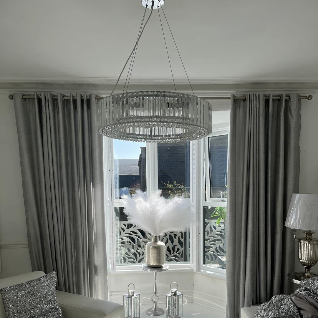 Elegante candelabro de cristal para techo, diseño redondo y moderno para comedor.