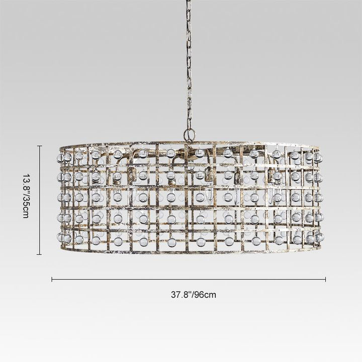 Lámpara de techo candelabro vintage, cristal facetado y metal plata, diseño tambor industrial.