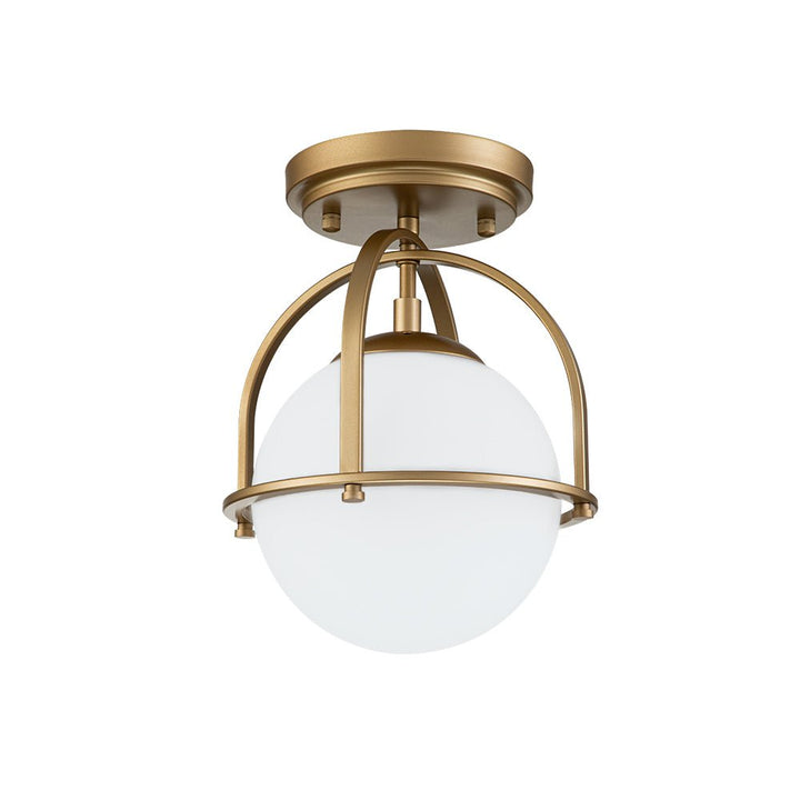 Luz de techo semi empotrada con globo de vidrio, estilo mid-century, perfecta para ambientes contemporáneos.