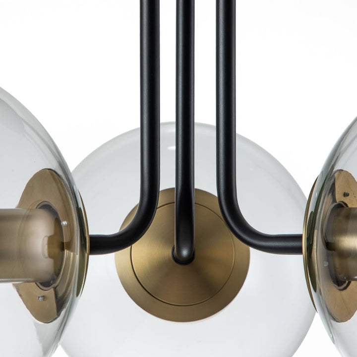 Iluminación decorativa: Lámpara de techo sputnik, 3 luces de vidrio transparente, estilo mid-century chic.