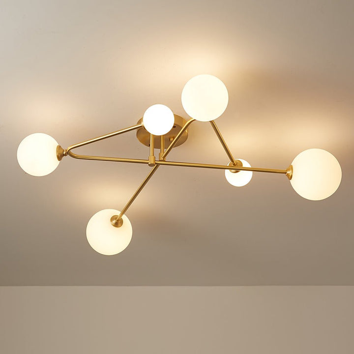 Lámpara techo moderna 6 luces, estilo Sputnik lineal. Ideal para ambientes Mid-Century, con acabados metálicos.