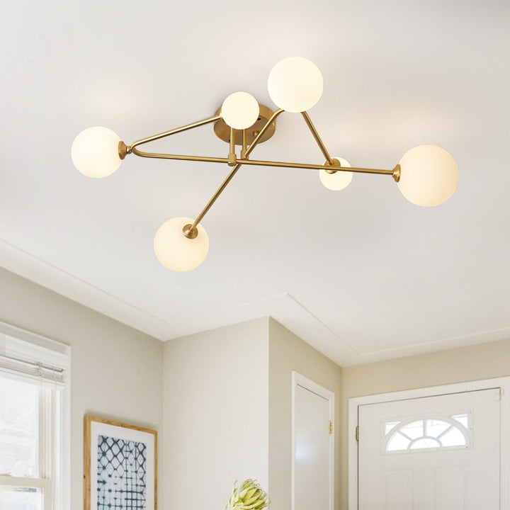 Lámpara de techo Sputnik lineal 6 luces estilo Mid-Century. Iluminación moderna con pantallas de vidrio y metal.
