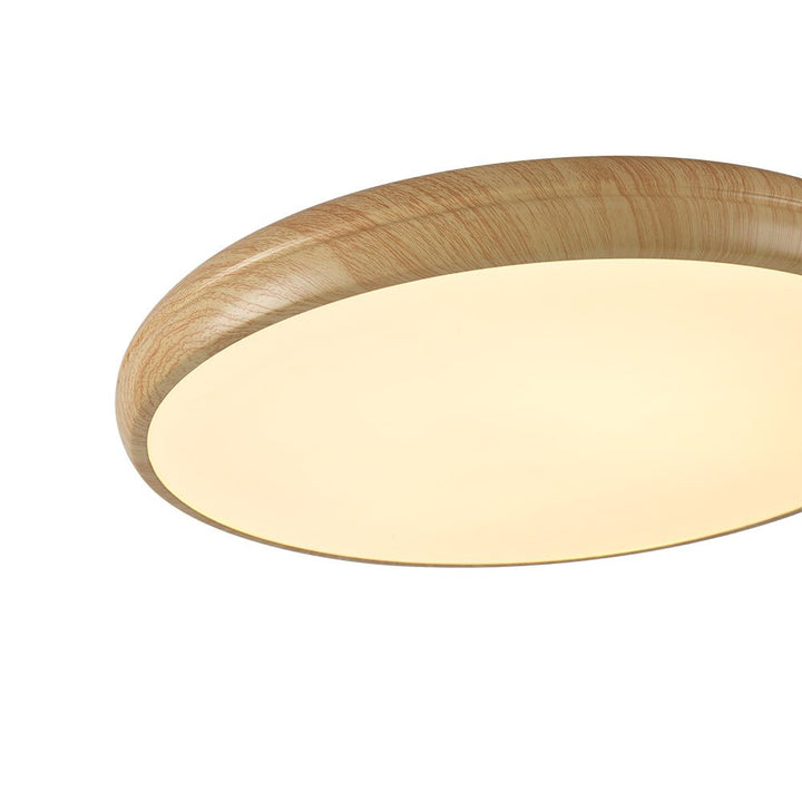 Lámpara LED de techo circular con aspecto de madera, ideal para cocinas y pasillos.