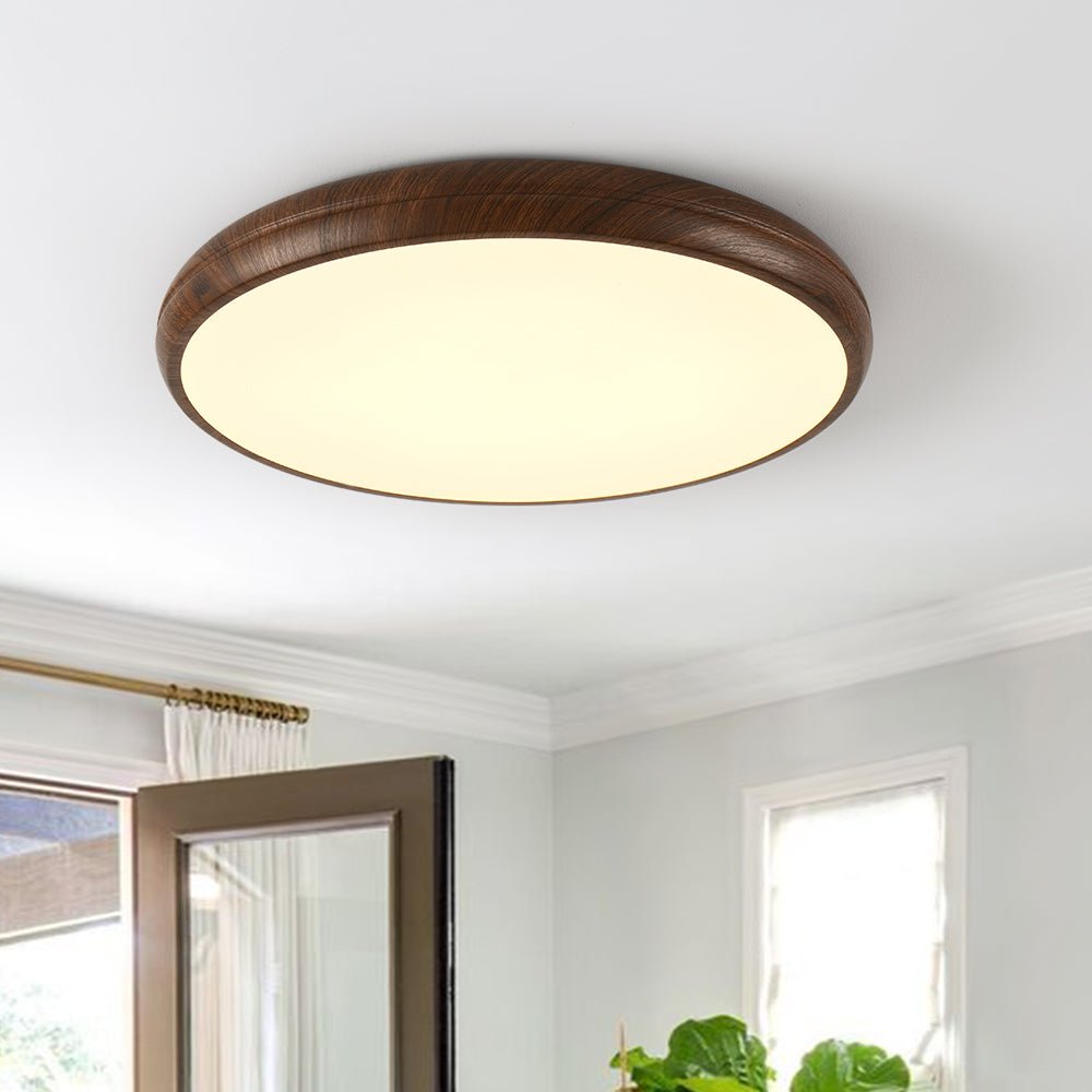 Plafón LED redondo minimalista con acabado de grano de madera de nogal para techo.