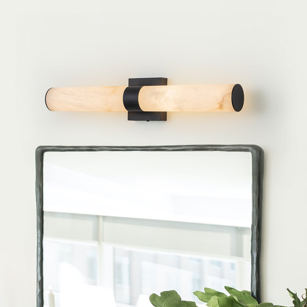 Aplique LED de pared moderno, diseño cilindro de mármol negro para iluminación interior.