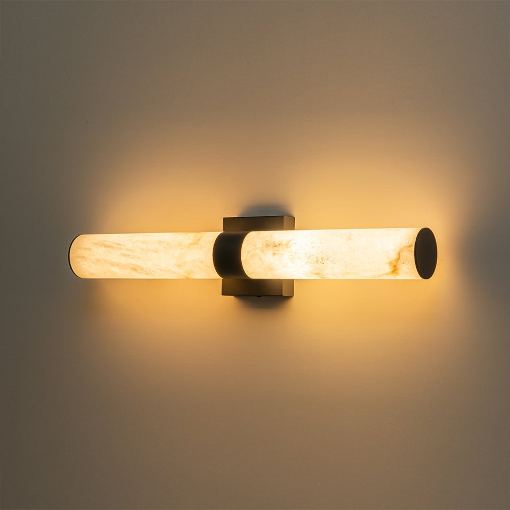 Aplique moderno de mármol negro con luz LED, diseño de cilindro para pared.