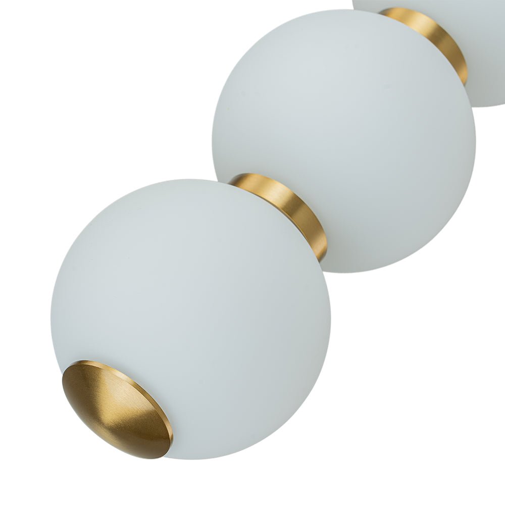 Iluminación colgante LED moderna con 4 luces y perlas de vidrio, perfecta para isla de cocina.