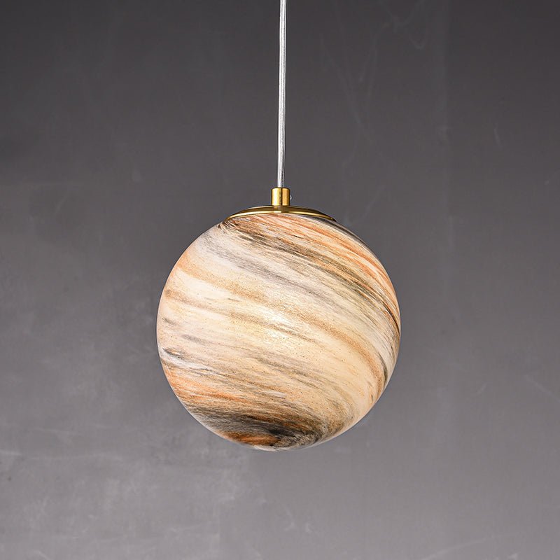 Lámpara colgante contemporánea de vidrio Saturno. Luz decorativa esférica para ambientes modernos.