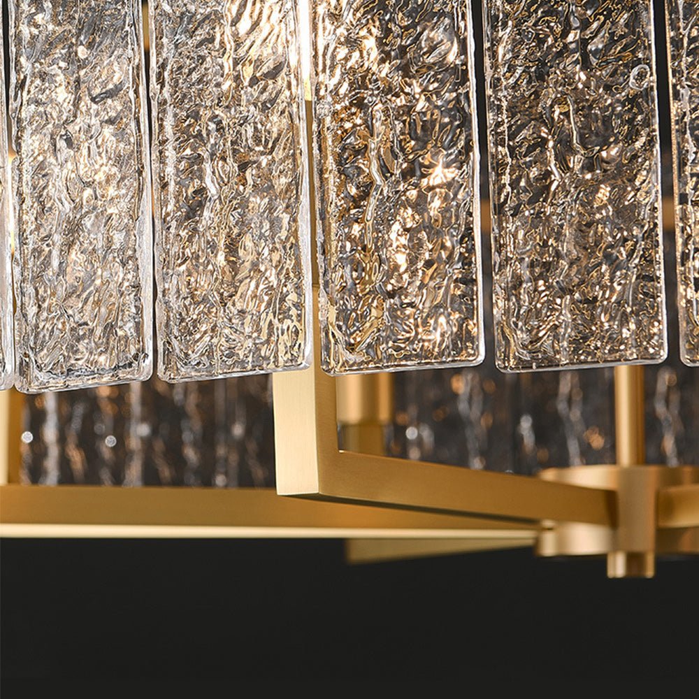 Iluminación moderna: candelabro de tambor con 6 luces, vidrio ondulado y latón, para un ambiente sofisticado.