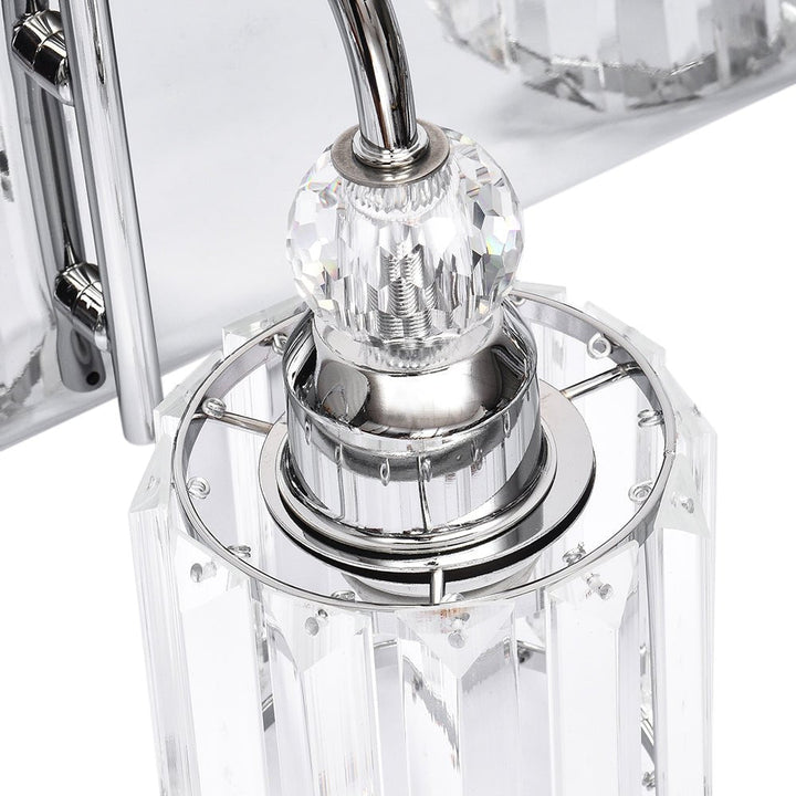 Luz de vanity para baño, diseño elegante en cromo con focos modernos.