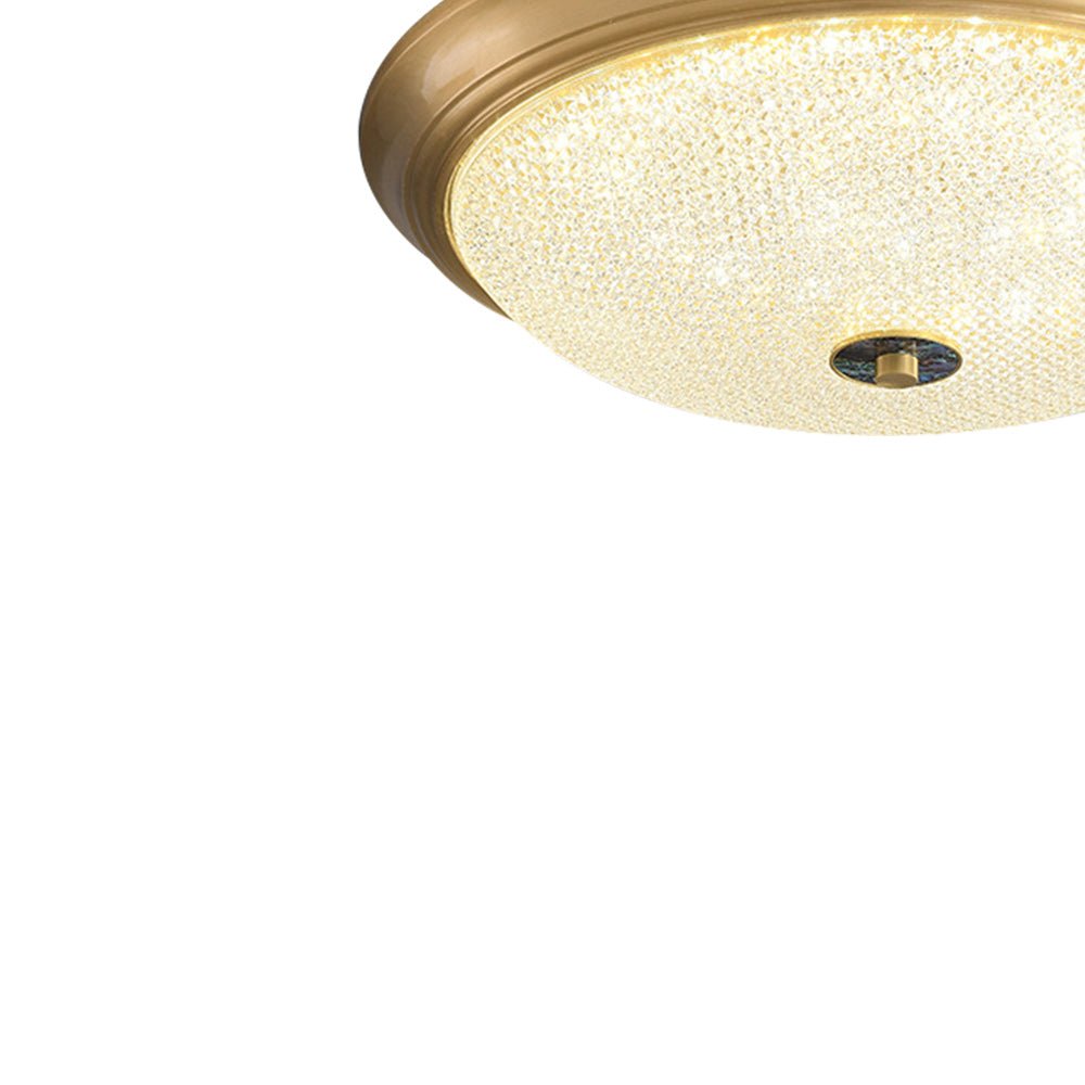 Iluminación moderna con luz de techo LED empotrada dorada, regulable y tricolor, estilo minimalista.