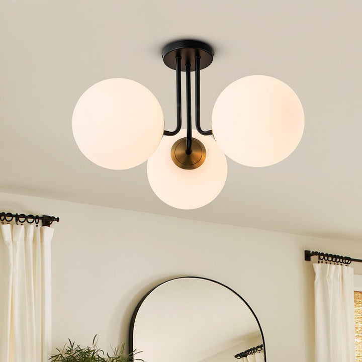 Luz de techo semi empotrada estilo Sputnik, 3 bombillas. Aporta un toque vintage y elegante.