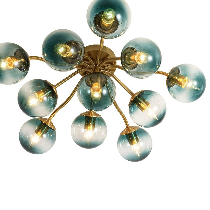 Iluminación Sputnik de techo, globos de vidrio azul degradado y estructura de latón.