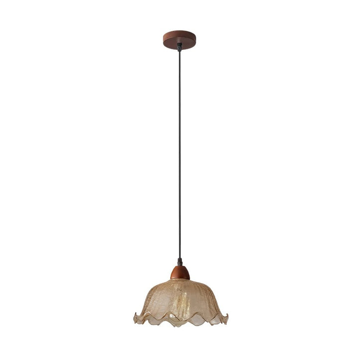 Lámpara colgante floral ámbar de cristal para iluminación cálida en vestíbulo.