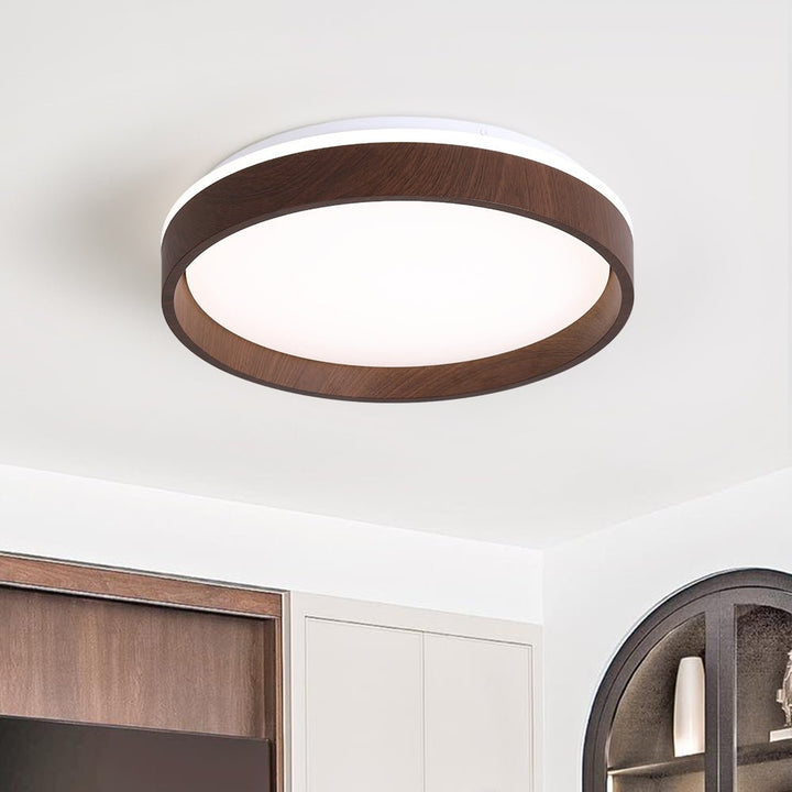 Luz de techo LED redonda moderna, diseño empotrado para iluminación interior eficiente en el hogar.