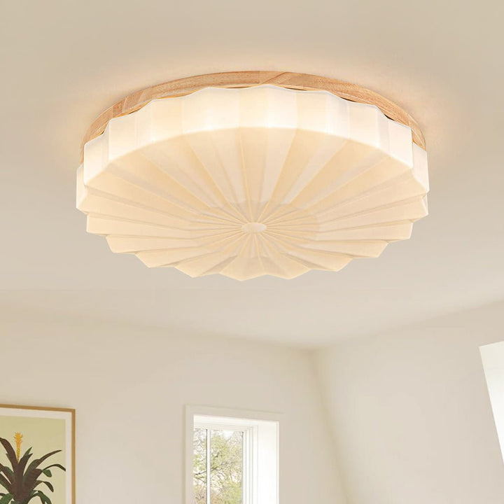 Luz de techo LED redonda con diseño floral plisado, 3 tonos. Iluminación moderna y ambiente ajustable.