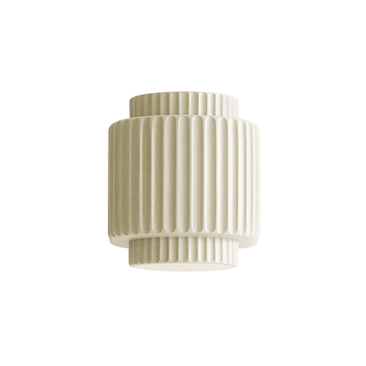 Luz de pared verde nórdica. Aplique cilíndrico con diseño de capas, ideal para decoración interior moderna.