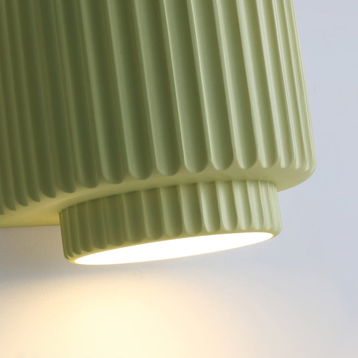 Luz de pared nórdica para ambiente. Aplique cilíndrico de capas, ideal para decoración cálida y relajante.