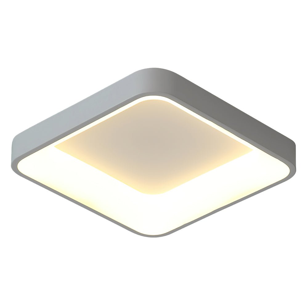 Foco de techo LED cuadrado plano, estilo contemporáneo. Ideal para cocina o pasillo. Luz eficiente y decorativa.