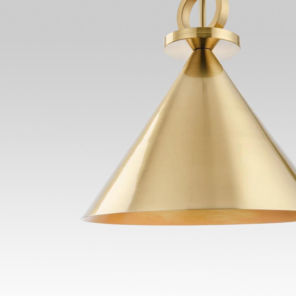 Foco direccional en lámpara colgante de polea, ideal para iluminar espacios contemporáneos con estilo.
