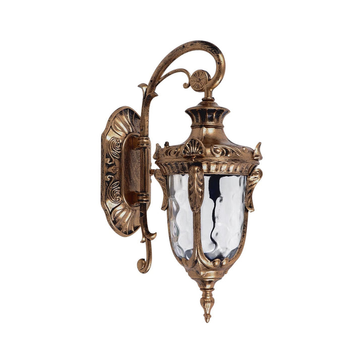 Lámpara exterior bronce antiguo con vidrio martillado, un toque decorativo vintage para tu terraza.
