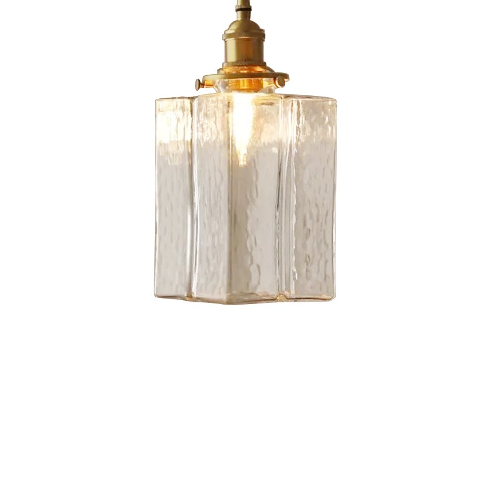 Colgante retro de latón y vidrio agua. Iluminación vintage para comedor o sala.