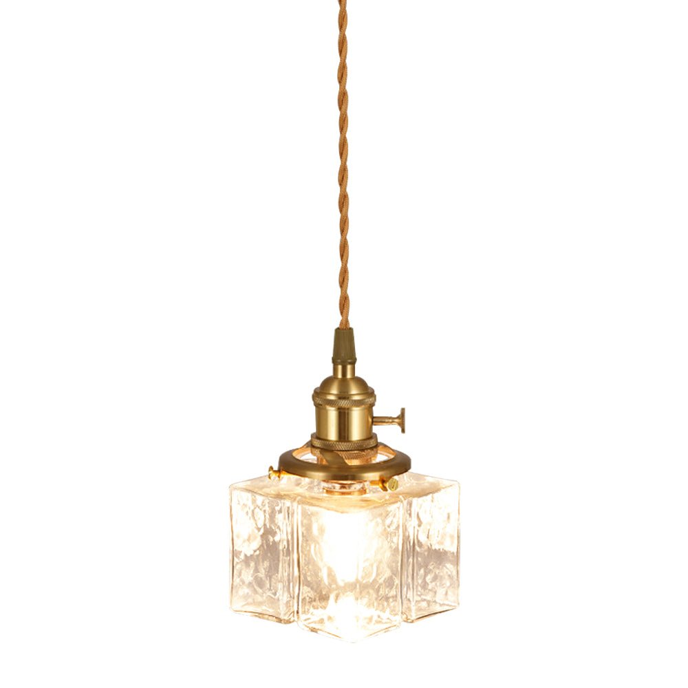 Lámpara colgante vintage de vidrio martillado. Iluminación retro para espacios modernos.
