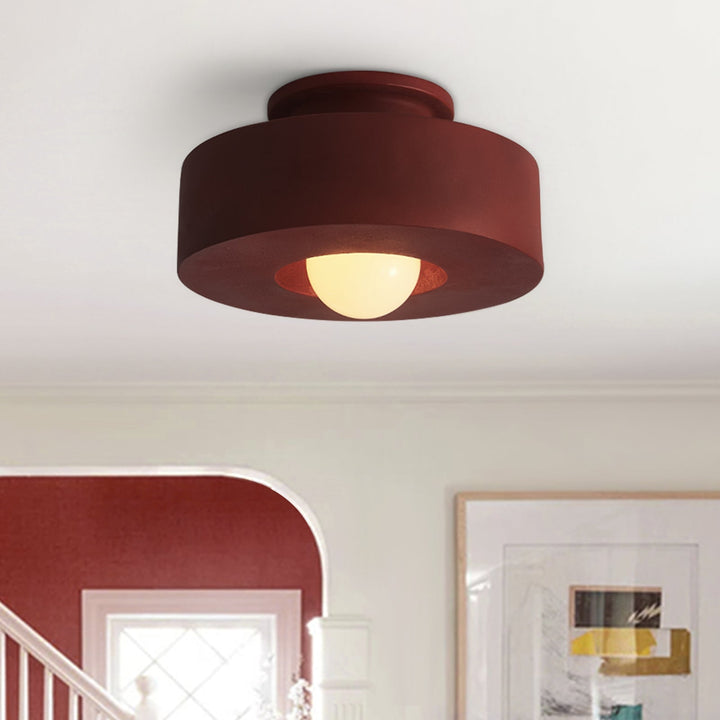 Lámpara de techo cilíndrica wabi sabi de resina. Iluminación minimalista para ambiente moderno.