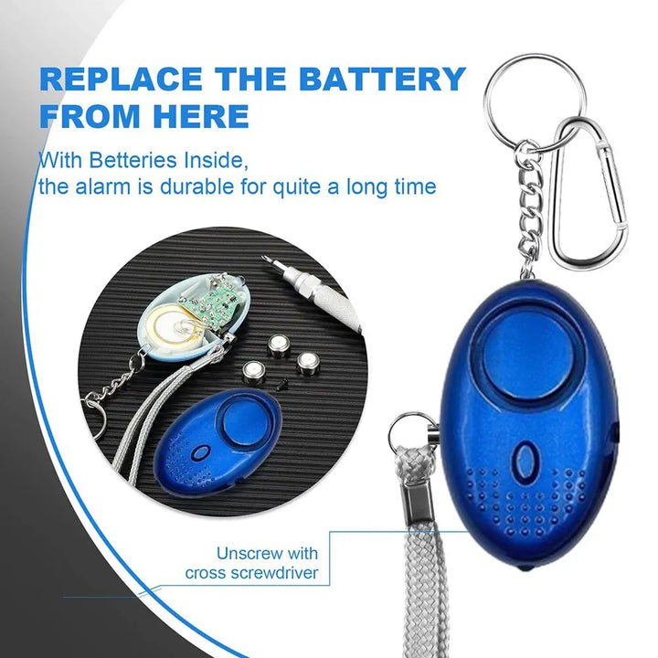 Alarma de seguridad personal con luz LED para visibilidad nocturna. Compacta para bolsos o mochilas.