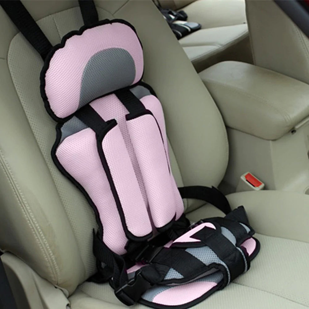 Silla ligera infantil con arnés de seguridad, perfecta para coche y niños 0 a 12 años.