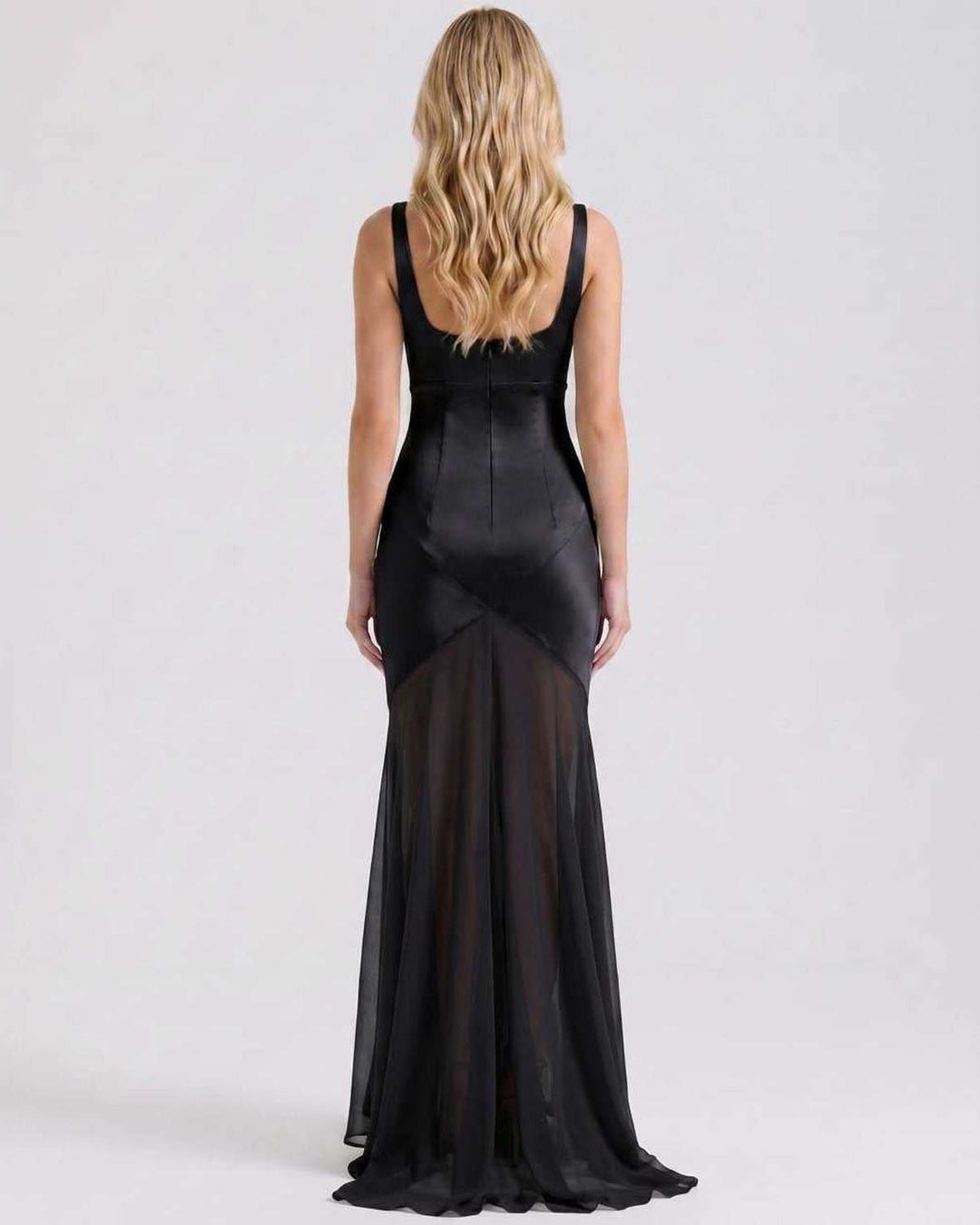 Vestido formal de mujer, corte maxi y sin mangas, perfecto para eventos que requieren un estilo refinado.