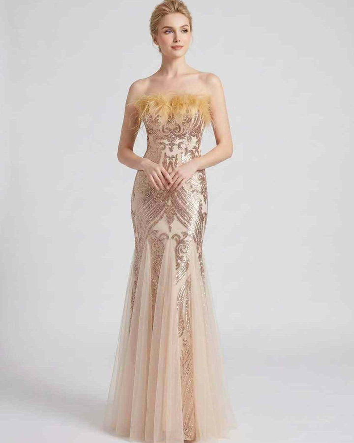Vestido maxi de noche con lentejuelas y plumas, sin mangas. Para brillar en la oscuridad.
