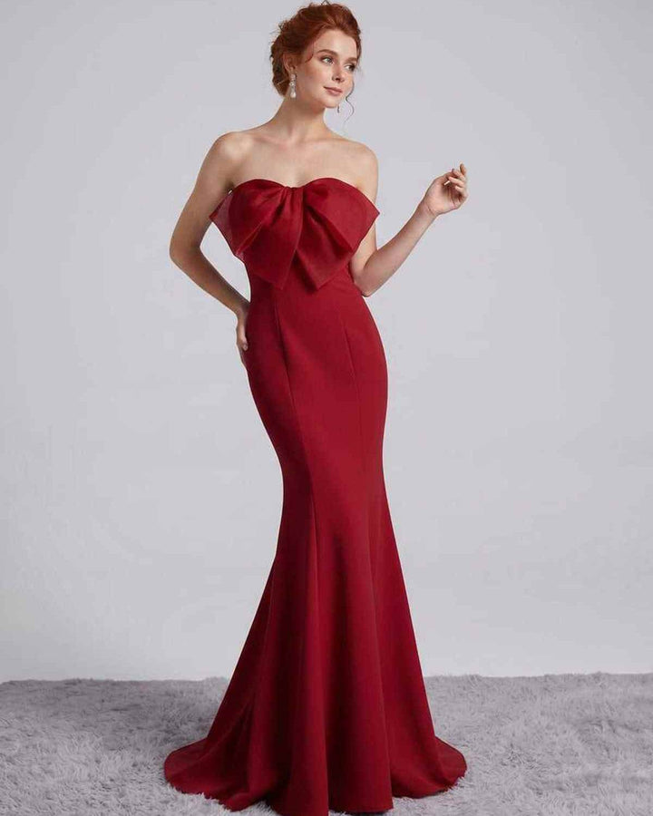 Elegante vestido de noche, corte sirena, para eventos formales y ocasiones especiales.
