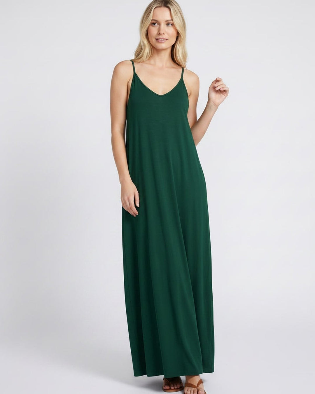 Elegante vestido maxi con escote en V y bolsillos, para fiestas o vacaciones de verano.