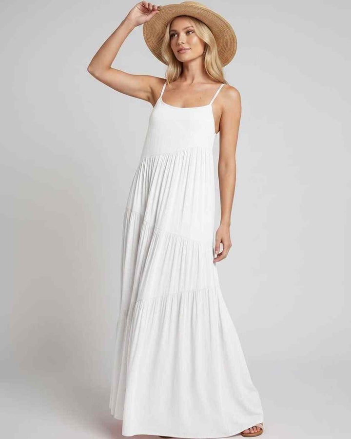 Vestido de resort fluido y elegante para cenas especiales.