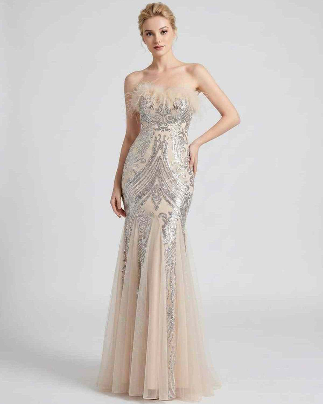 Vestido de gala con plumas y lentejuelas, diseño sirena. Para una noche mágica.